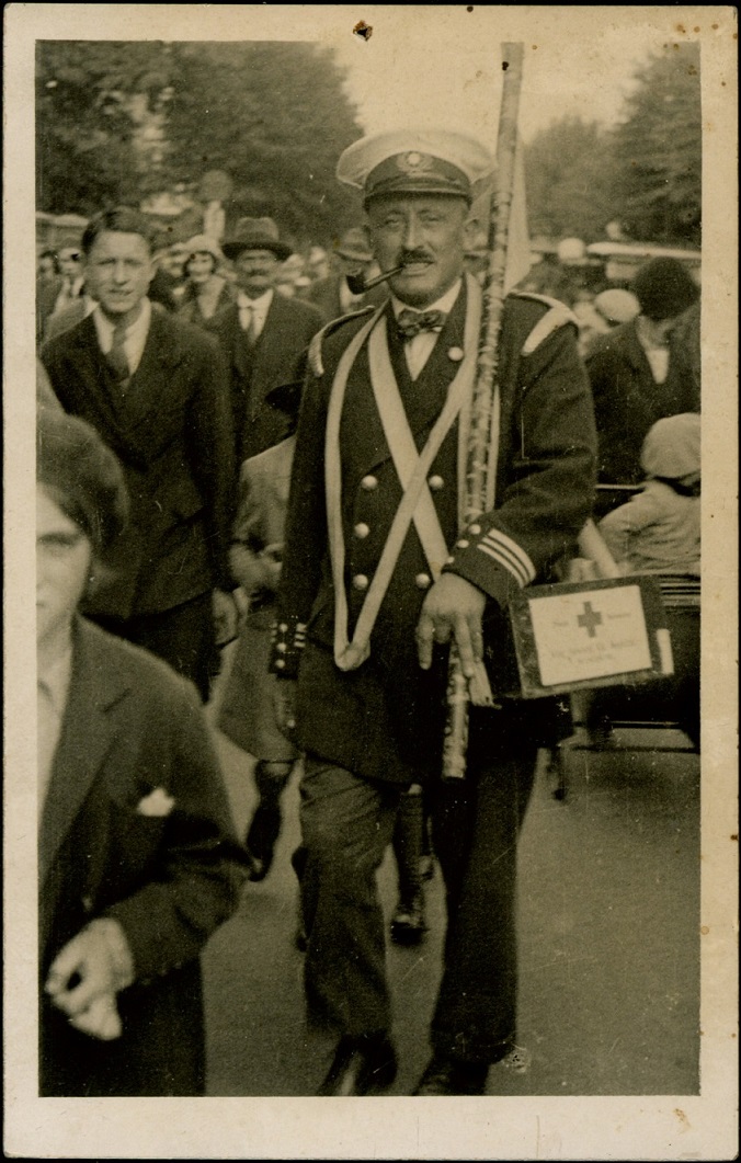 Photograph, Man with ‘King Edward Hospital’ box, 1920s