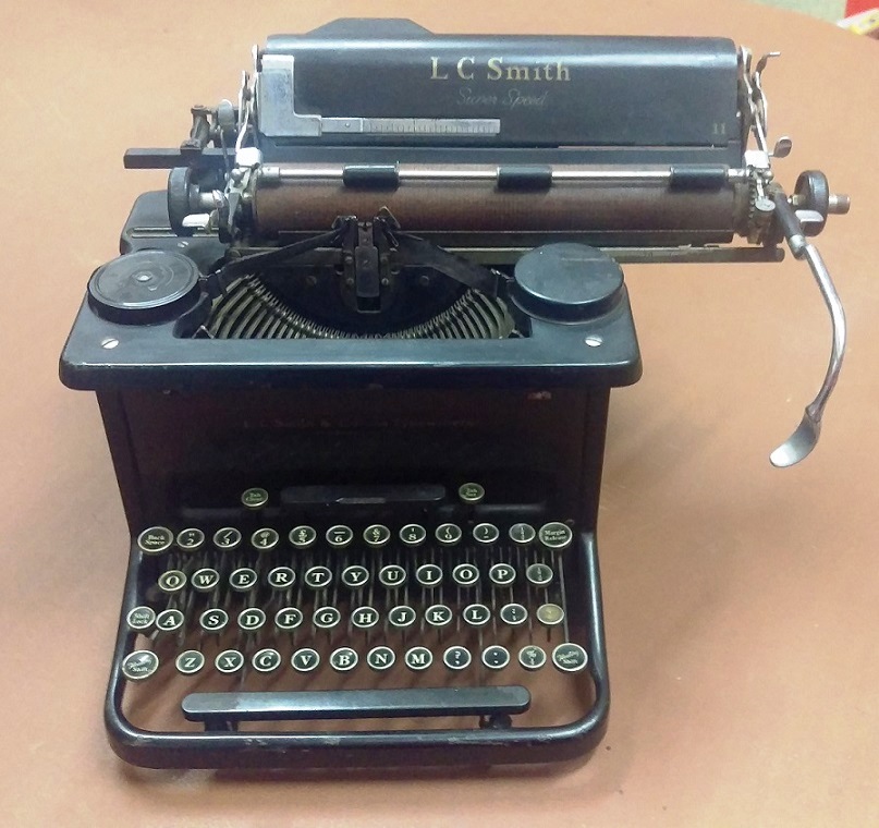 Typewriter made by L C Smith & Corona, metal, rubber & chrome c.1950.